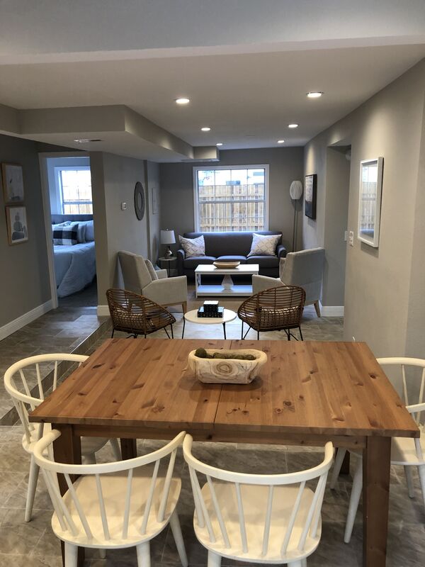 Open living and dining room after a whole-home renovation in Tampa Bay