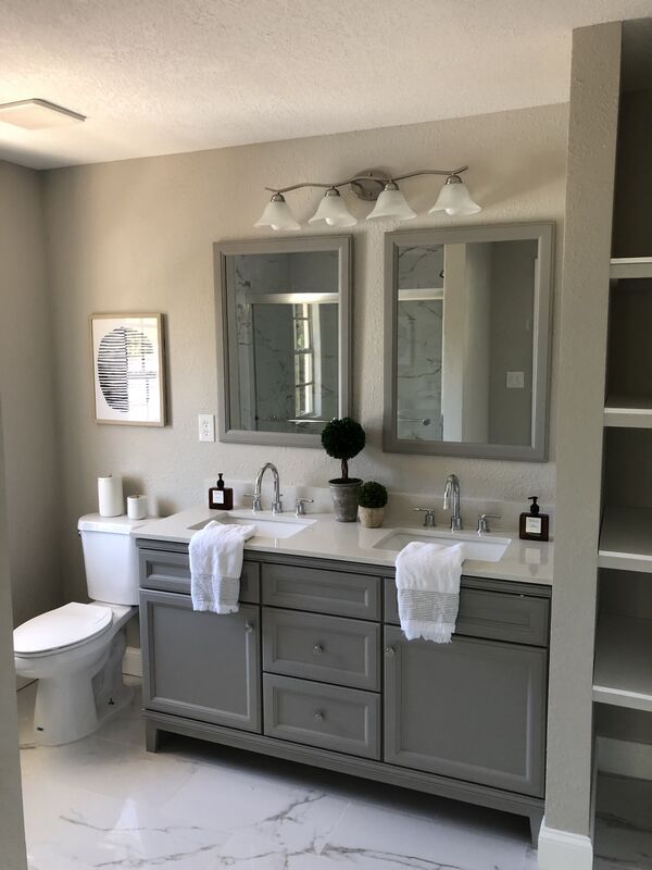 Renovated living space with new flooring, trim and doors