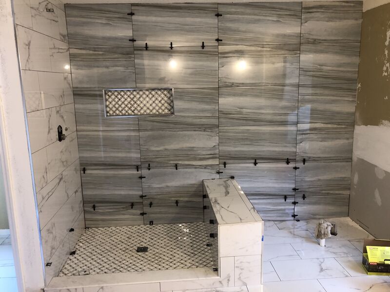 Waterproofed shower pan and cement board ready for tile