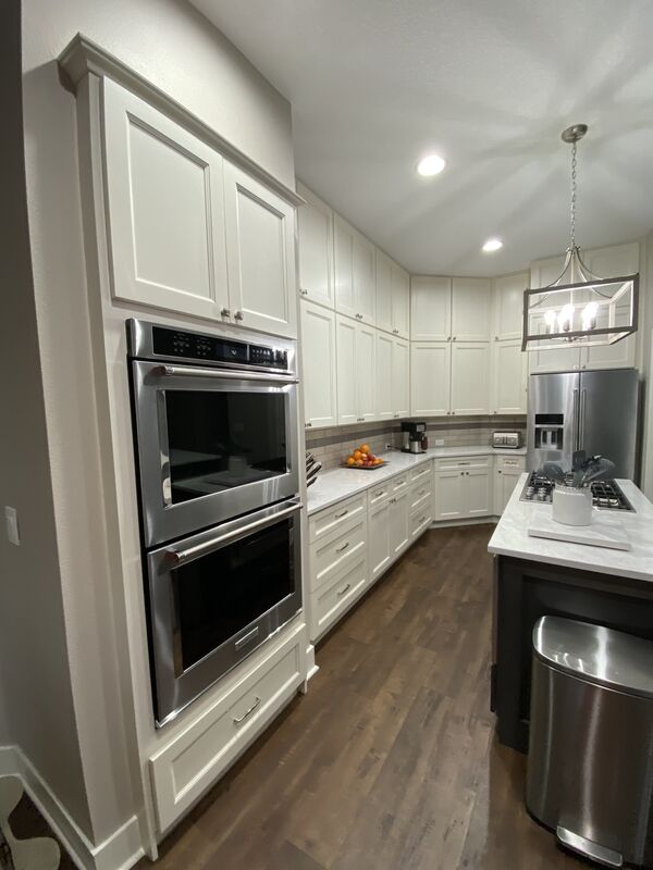 Finished kitchen cabinetry, counters and backsplash detail